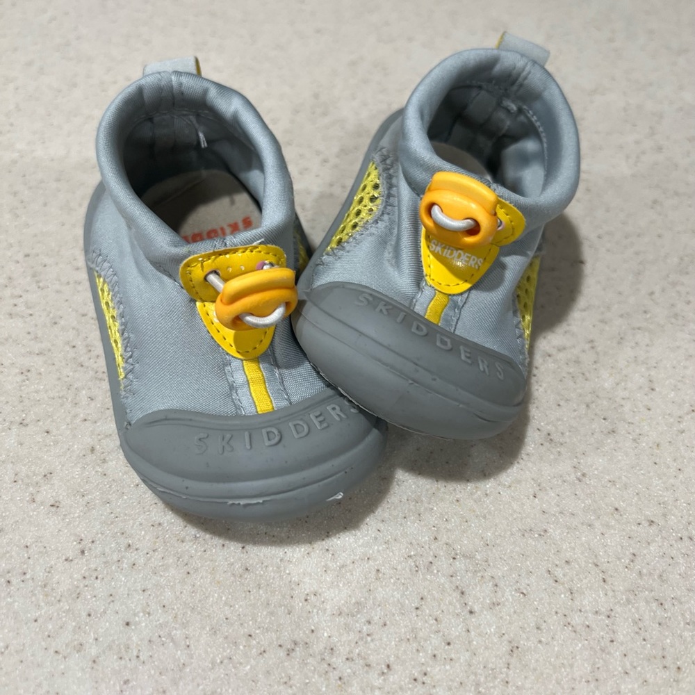 Infant size 4 Skidders / slip on water shoes.